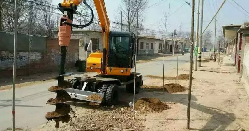 Yichen is a professional manufacturer of auger and screening bucket. Yichen auger drive is a drilling device designed for excavator or skid steer loader hydraulic system. Yichen auger drive can fit to base machine from 1.5 to 40 tons. Yichen Screening Bucket is a universal auxiliary tool suitable for loaders, excavators or skid steers, which can complete screening, crushing, aeration, mixing, stirring, separation, feeding and loading materials in one step.——The wonderful use of auger and screening bucket in garden construction